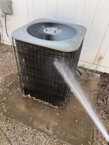 AC Maintenance Peoria AZ technician performing system inspection
